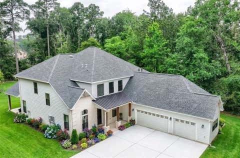 Photo of 11715 Creek View Lane, Conroe, TX 77385 (MLS # 83871676)