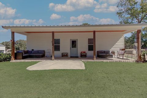 Photo of 101 Silcox Lane, Cleveland, TX 77328 (MLS # 49838446)
