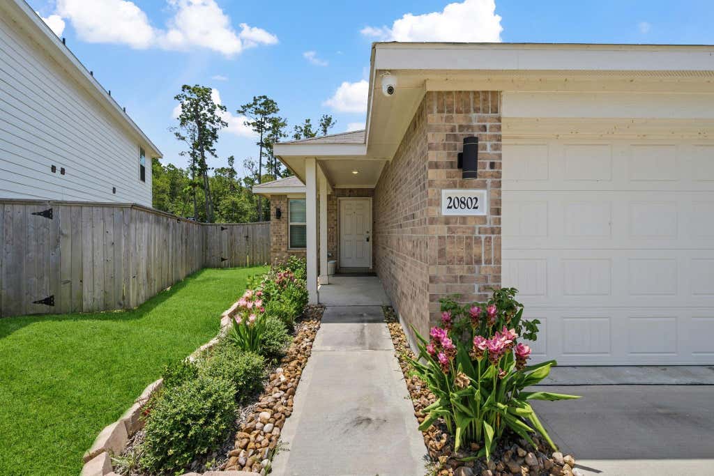 Photo of 20802 Masella Ridge Drive, New Caney, TX 77357 (MLS # 24256036)