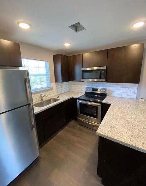 Photo of 1723 Alta Vista Street #C, Houston, TX 77023 (MLS # 92365997)