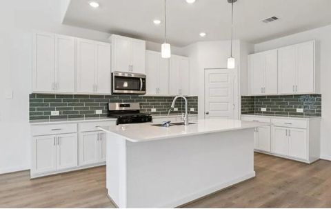 Photo of 31114 De La Guerra St, Huffman, TX 77336 (MLS # 69264947)