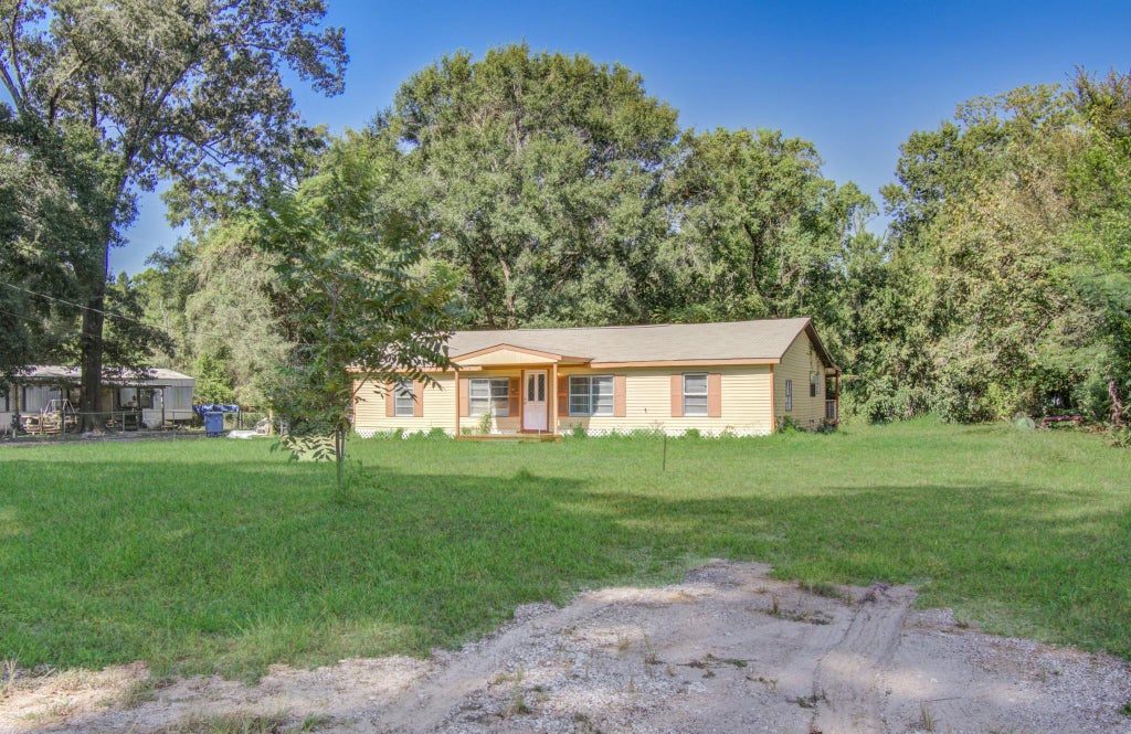 Photo of 20496 Mcgager Drive, New Caney, TX 77357 (MLS # 16314780)