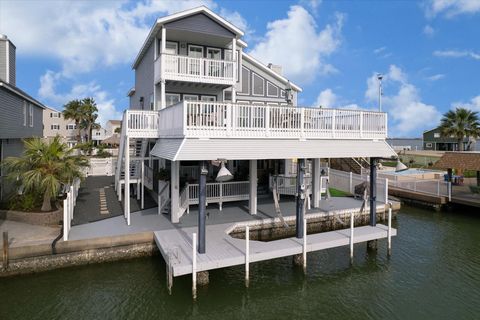Photo of 406 Tahiti Road, Tiki Island, TX 77554 (MLS # 37274299)