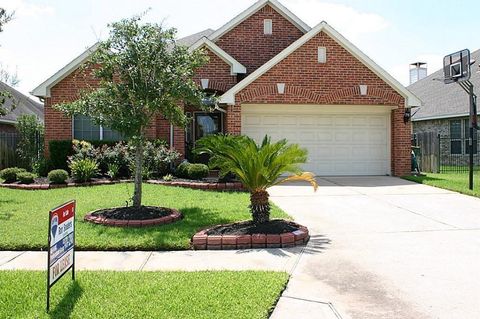 Photo of 10135 Lazy Lagoon, Houston, TX 77065 (MLS # 62550136)