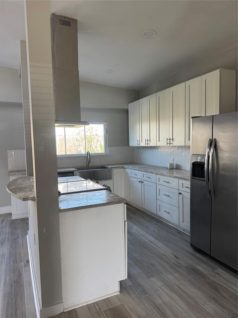 Photo of 7526 Dearborn Street, Houston, TX 77055 (MLS # 41250121)