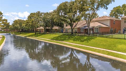 Photo of 10230 E Summit Canyon Drive, Houston, TX 77095 (MLS # 22273733)