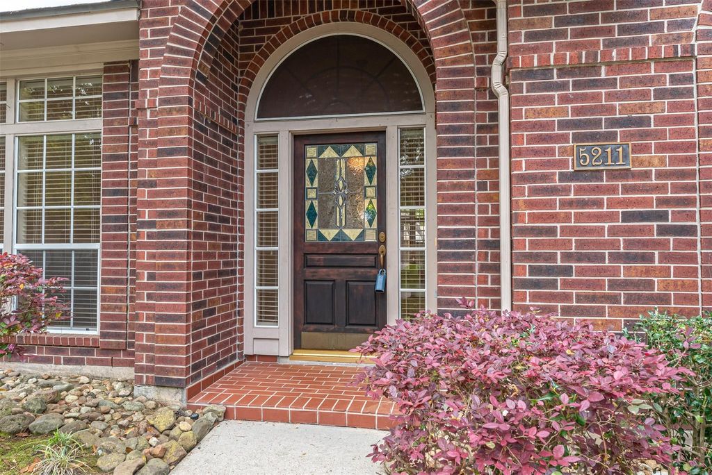 Photo of 5211 High Glen Court, Houston, TX 77345 (MLS # 26999915)