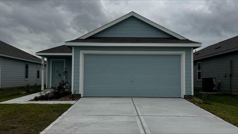 Photo of 673 Maria Elena Way, Cleveland, TX 77327 (MLS # 82016975)