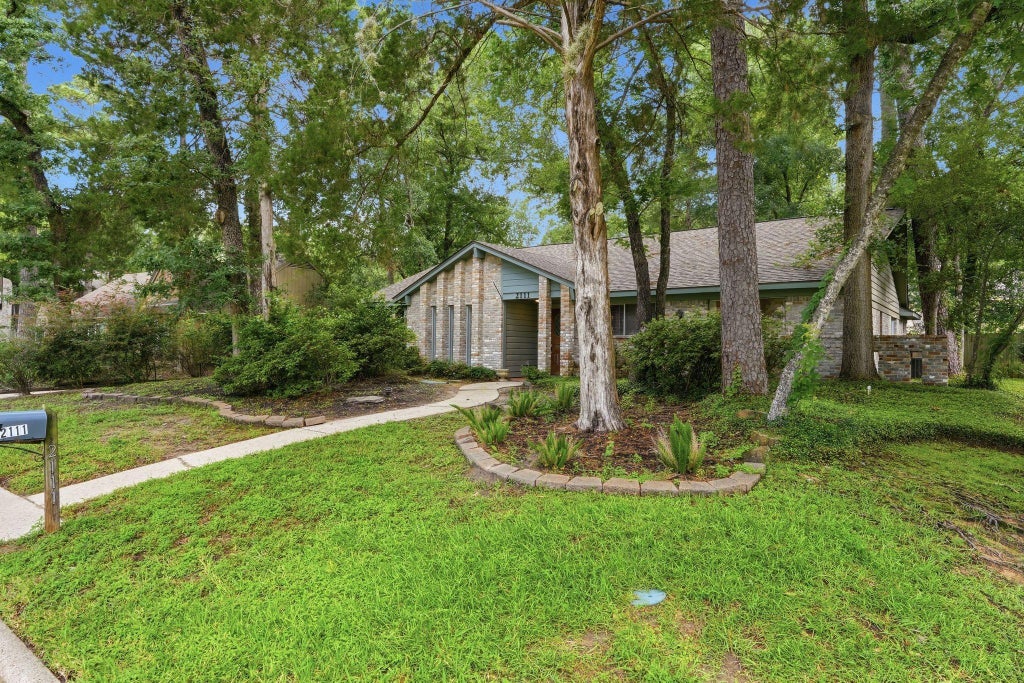 Photo of 2111 Riverlawn Drive, Houston, TX 77339 (MLS # 84294748)
