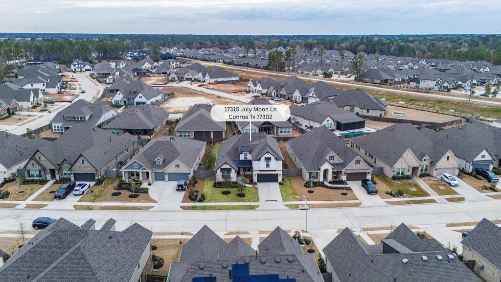 Photo of 17315 July Moon Lane, Conroe, TX 77302 (MLS # 50708110)