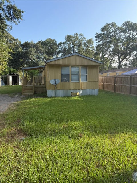 Photo of 113 Rice Street, Cleveland, TX 77327 (MLS # 67395236)