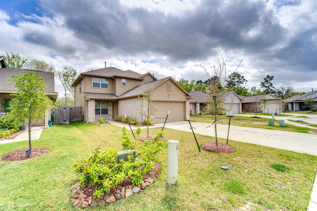 Photo of 19583 Manduca Drive, New Caney, TX 77357 (MLS # 71788861)