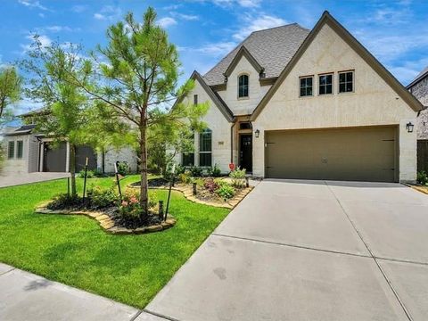Photo of 12046 Texas Trumpet Trail, Humble, TX 77346 (MLS # 25304412)