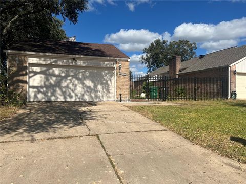 Photo of 9610 Tarragon Lane, Houston, TX 77036 (MLS # 60775096)