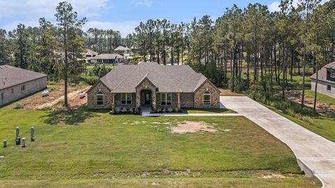 Photo of 13344 Wichita Fall Trail Rd, Conroe, TX 77303 (MLS # 92103729)