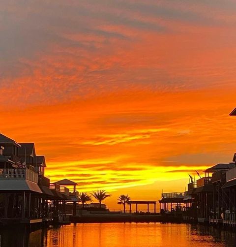 Photo of 422 Windward Way, Tiki Island, TX 77554 (MLS # 40678760)