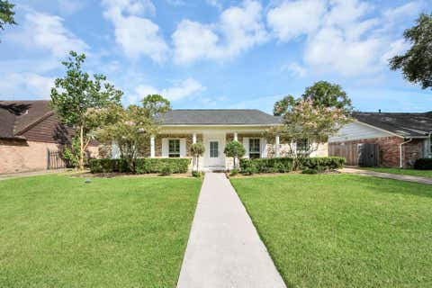 Photo of 12026 Sugar Springs Drive, Houston, TX 77077 (MLS # 23695103)