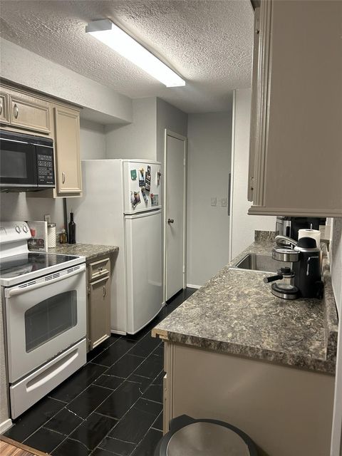 Photo of 7600 Emmett F Lowry Expressway #310, Texas City, TX 77591 (MLS # 62520038)