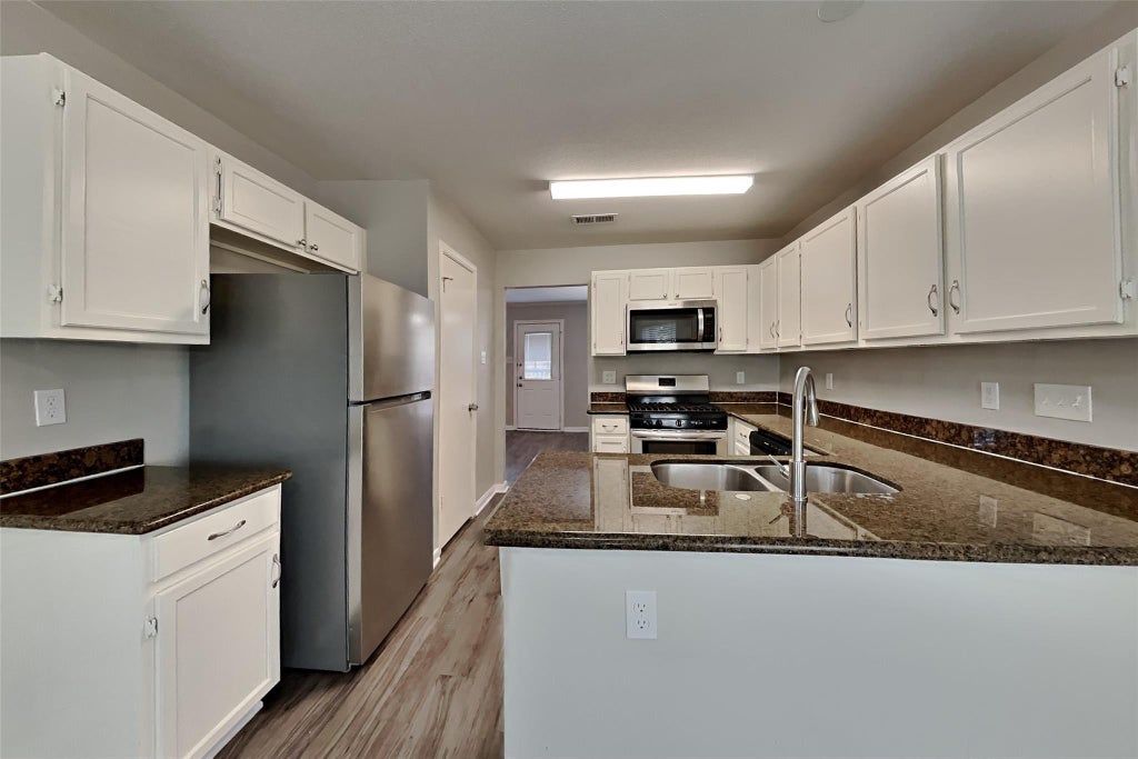 Photo of 2519 Clear Ridge Drive, Houston, TX 77339 (MLS # 77057900)