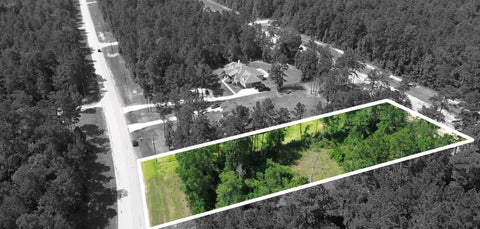 Photo of TBD Dipping Vat Road, Huntsville, TX 77340 (MLS # 91441637)