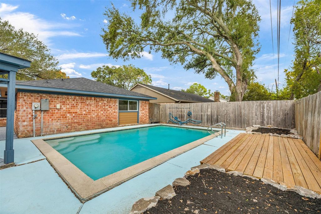 Photo of 9806 Sagebark Drive, Houston, TX 77089 (MLS # 51587570)