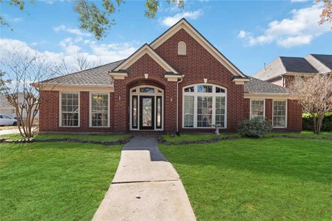 Photo of 7610 Limber Bough Drive, Humble, TX 77346 (MLS # 33995249)
