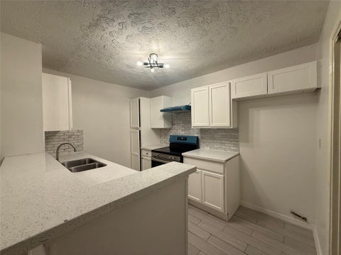 Photo of 8553 Wilcrest Drive, Houston, TX 77099 (MLS # 12626122)