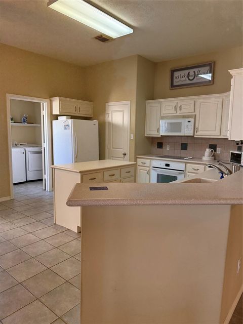 Tiny photo for 10522 Torrey Pines Dr Drive, Willis, TX 77318 (MLS # 64964096)