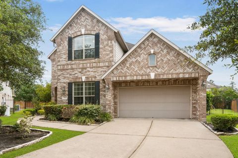 Photo of 11 Pintuck Place, Spring, TX 77389 (MLS # 69434357)