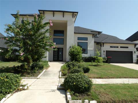 Photo of 10123 Regatta Shore Drive, Missouri City, TX 77459 (MLS # 42076645)