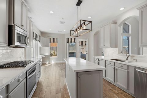 Photo of 8833 Snowy Owl Loop, Missouri City, TX 77459 (MLS # 19795779)