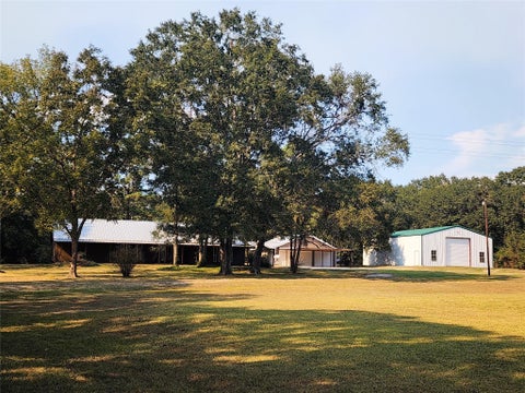 Photo of 557 Fm 2693 Road E, New Waverly, TX 77358 (MLS # 11360667)