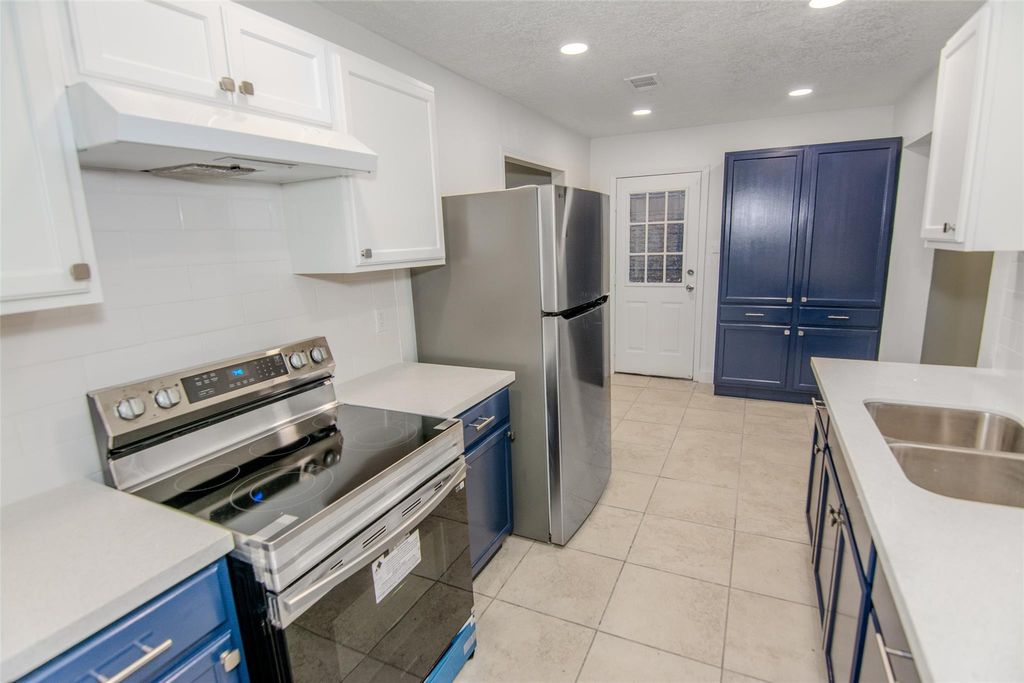 Photo of 2120 Godfrey Street, Baytown, TX 77521 (MLS # 54093142)