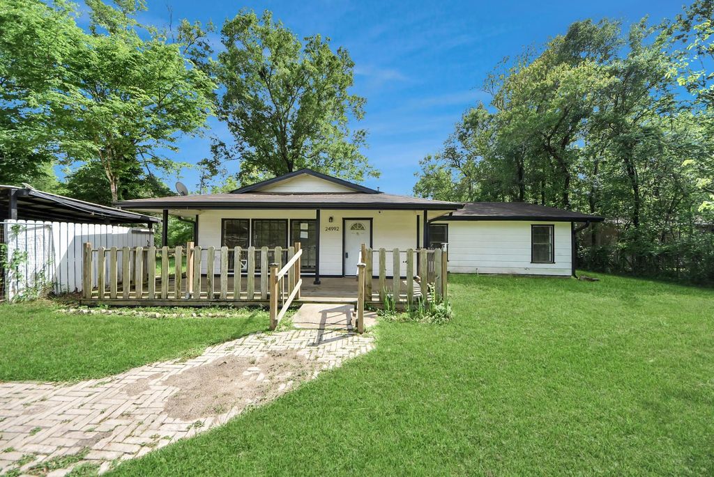 Photo of 24992 Country Estates Drive, New Caney, TX 77357 (MLS # 69066220)