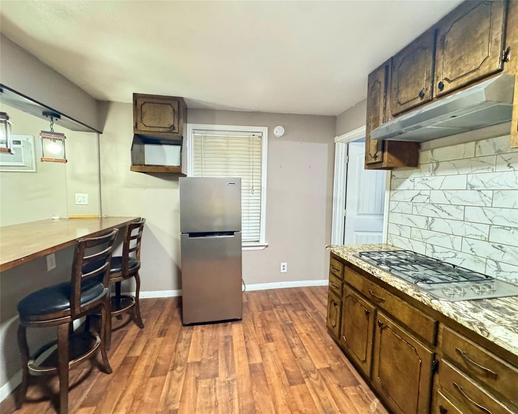 Photo of 403 Clear Lake Road, Highlands, TX 77562 (MLS # 45955597)