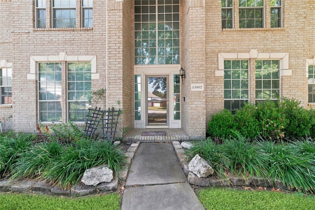 Photo of 13002 Brayton Court, Houston, TX 77065 (MLS # 76850658)