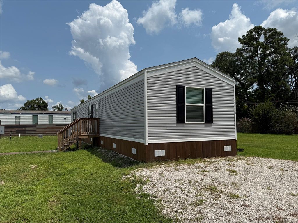 Photo of 20440 Vick Dr, New Caney, TX 77357 (MLS # 95394569)