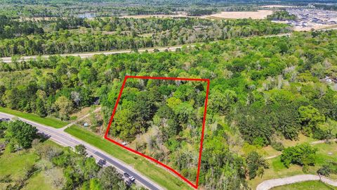 Photo of 31910 Fm 1485 Road, New Caney, TX 77357 (MLS # 9981539)