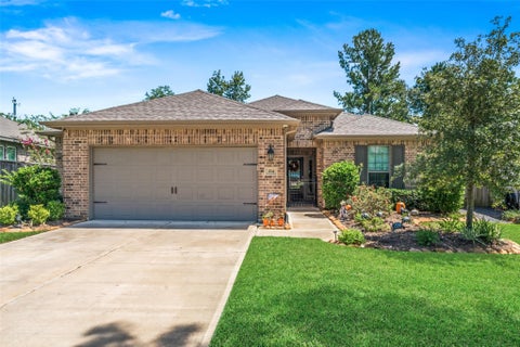Photo of 214 N Wild Petunia Trail, Montgomery, TX 77316 (MLS # 28764892)
