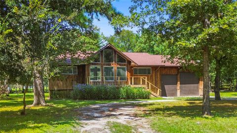 Photo of 31 Creek Point, Huntsville, TX 77320 (MLS # 41884036)