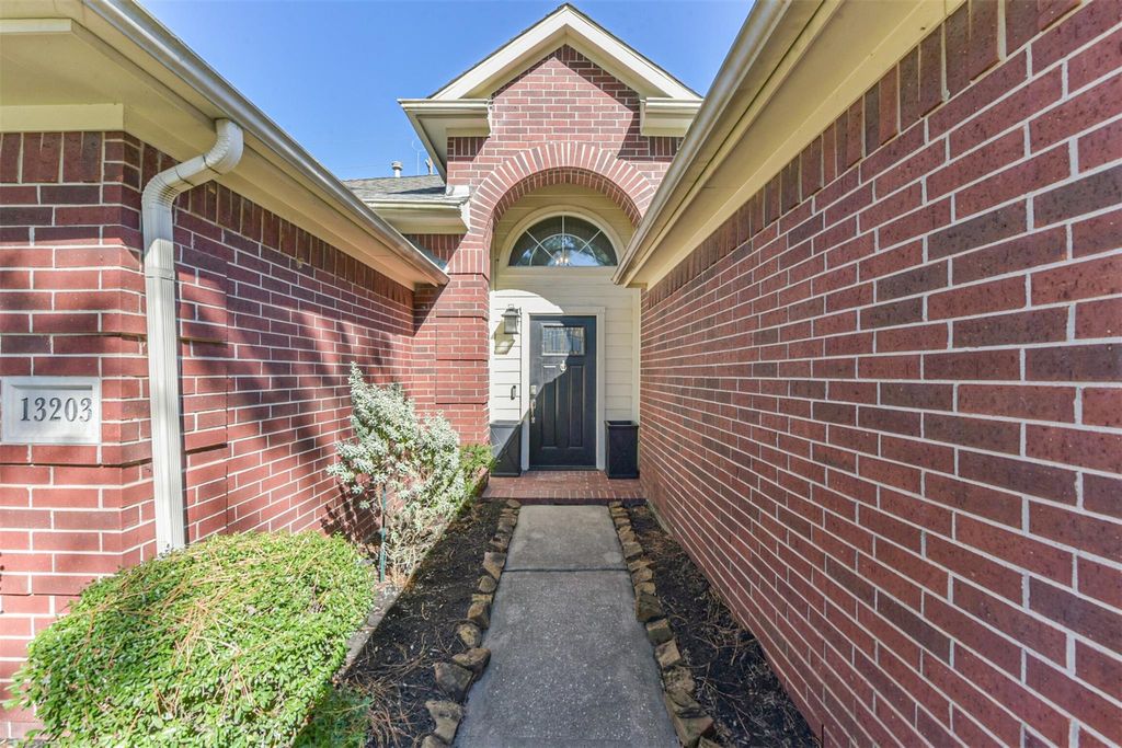 Photo of 13203 Yaupon Holly Lane, Houston, TX 77044 (MLS # 48609025)