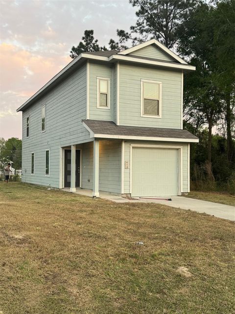 Photo of 614 Road 5203, Cleveland, TX 77327 (MLS # 63081499)