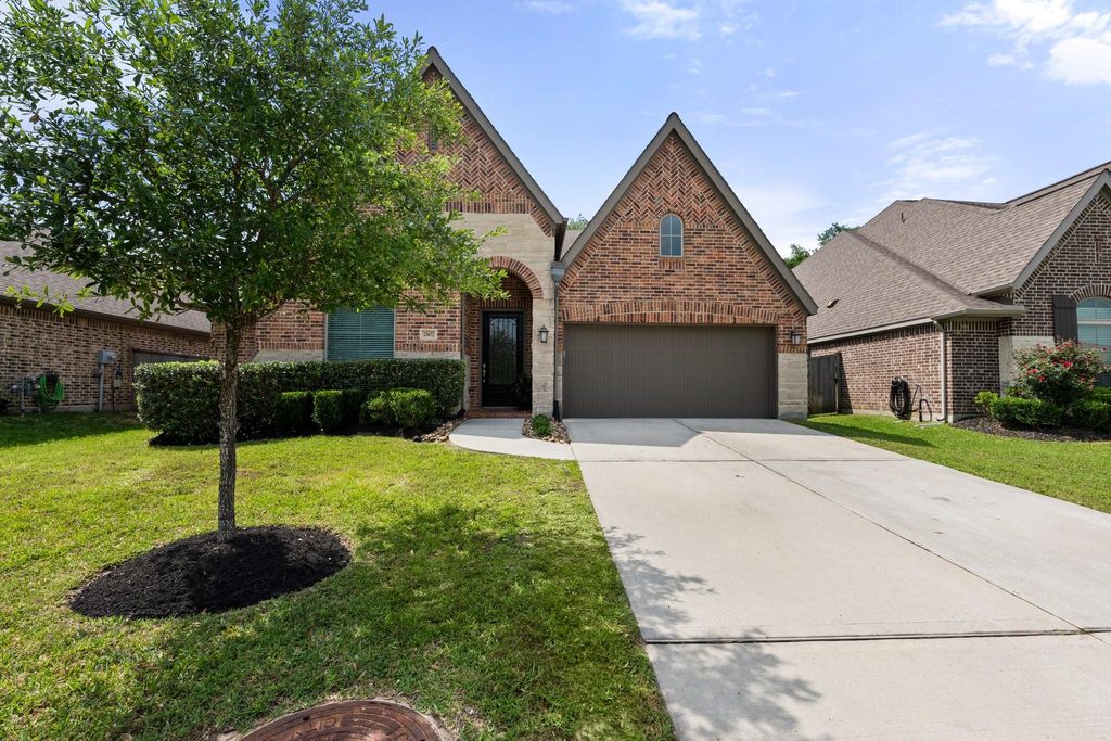 Photo of 23672 Crossworth Drive, New Caney, TX 77357 (MLS # 58981166)