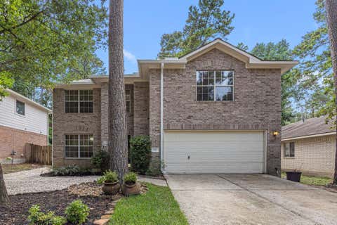 Photo of 202 W Misty Dawn Dr DR, The Woodlands, TX 77385 (MLS # 80659959)