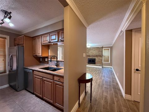 Photo of 10555 Turtlewood Court #1408, Houston, TX 77072 (MLS # 70929524)