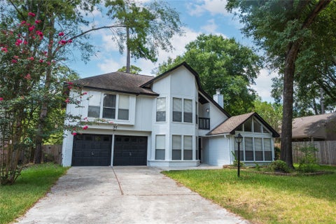 Photo of 31 N Drifting Leaf Court, The Woodlands, TX 77380 (MLS # 11028367)