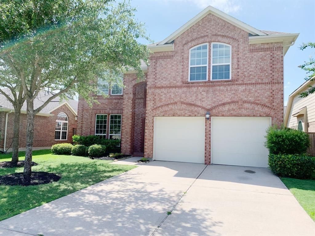 Photo of 24418 Ranchwood Springs Lane, Katy, TX 77494 (MLS # 86927883)