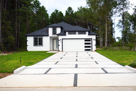 Photo of 602 Road 5201, Cleveland, TX 77327 (MLS # 92226401)