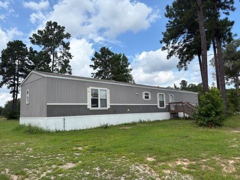 Photo of 12365 County Road 37495, Cleveland, TX 77327 (MLS # 15341252)