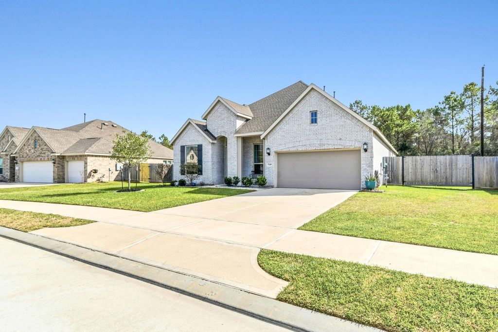 Photo of 15418 Kings Lake Court, Mont Belvieu, TX 77523 (MLS # 41357347)